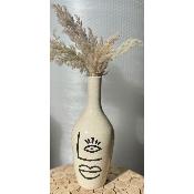 Vase en céramique avec œil
